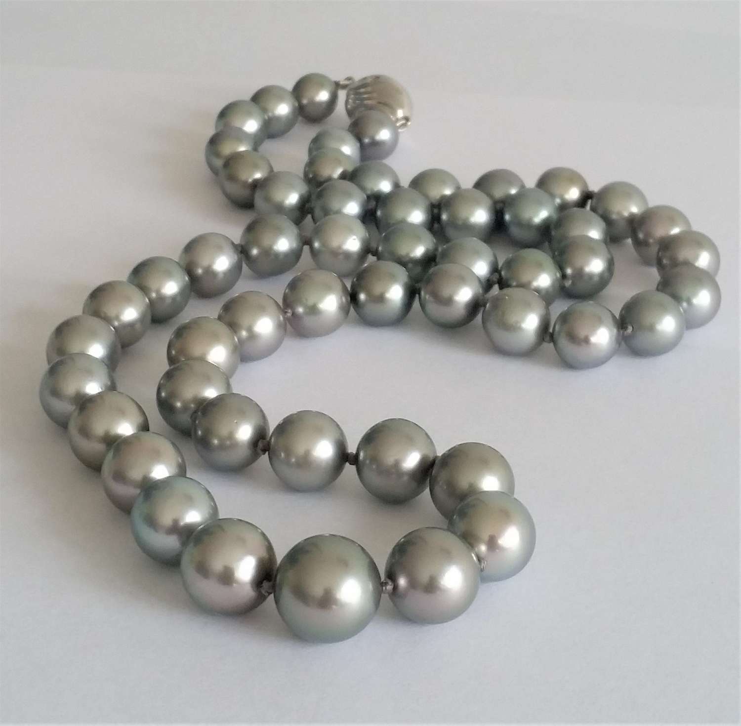 A row of Tahitian cultured pearls
