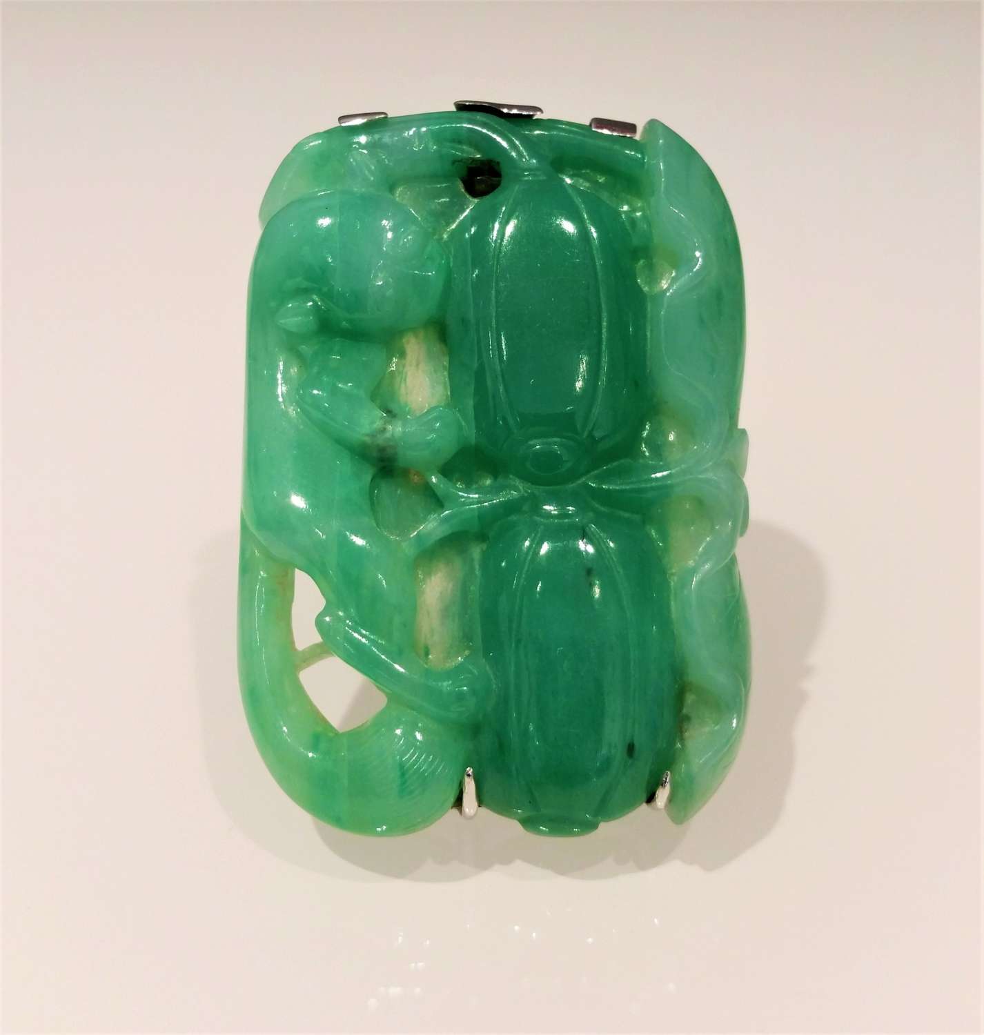 Chinese carved jade brooch mounted as a clip brooch