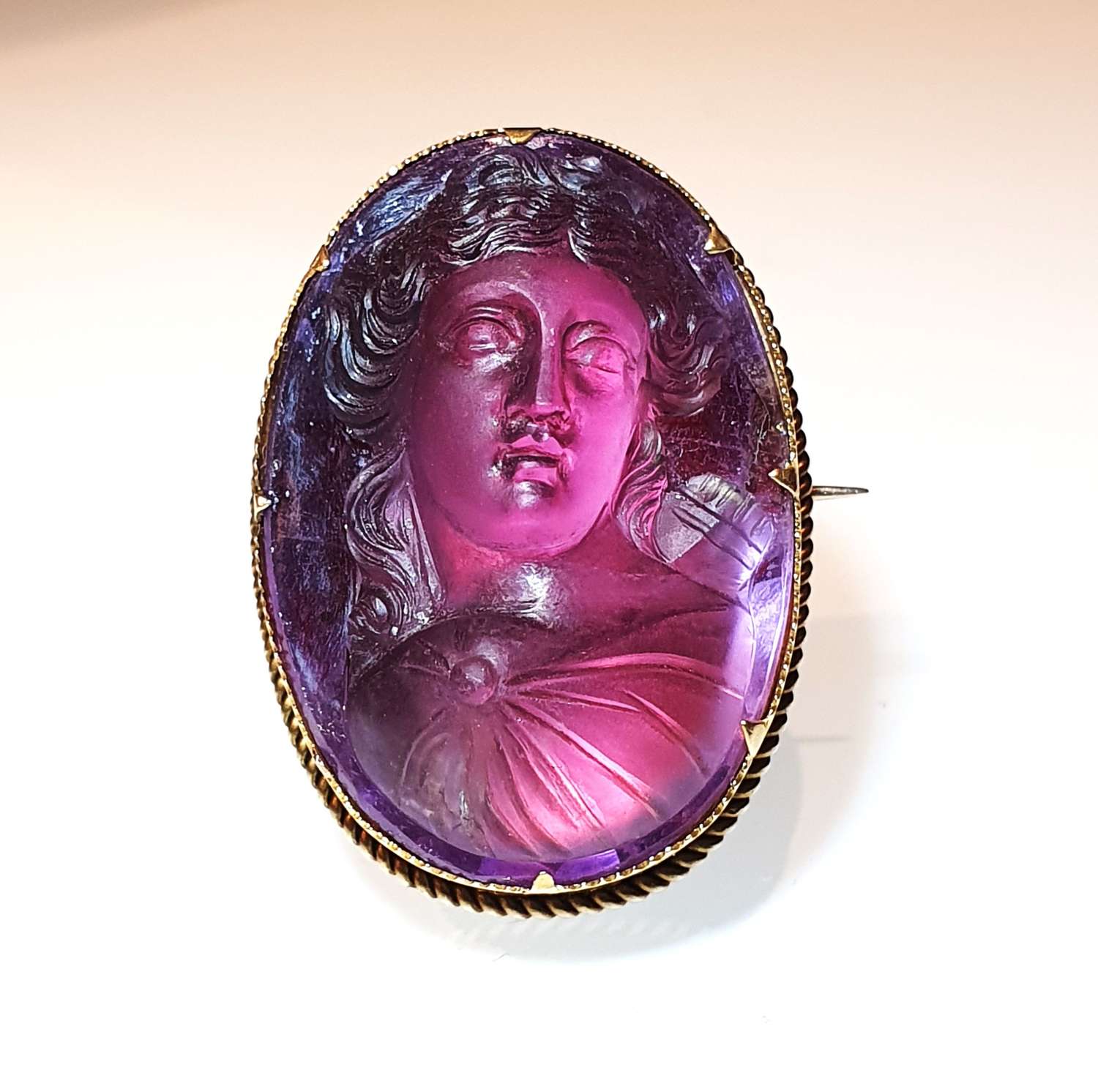 Carved amethyst cameo