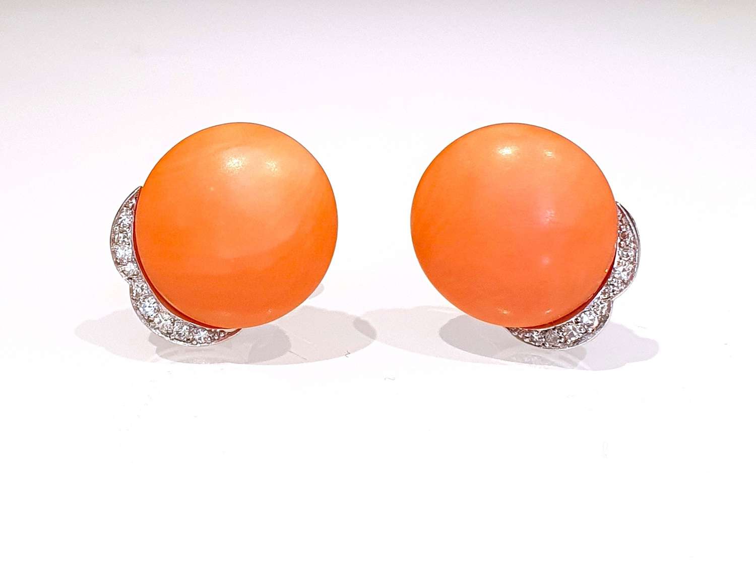 Coral and diamond stud earrings
