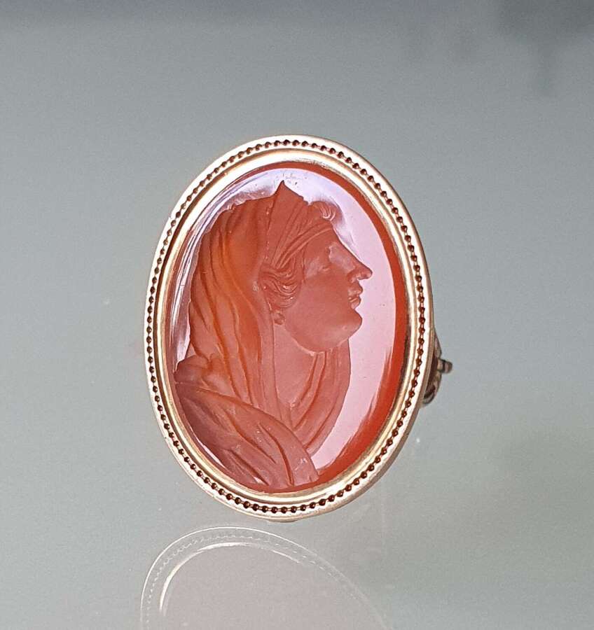 Gold fob seal with intaglio of a classical female head