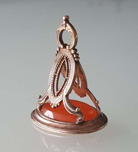 Gold fob seal with intaglio of a classical female head