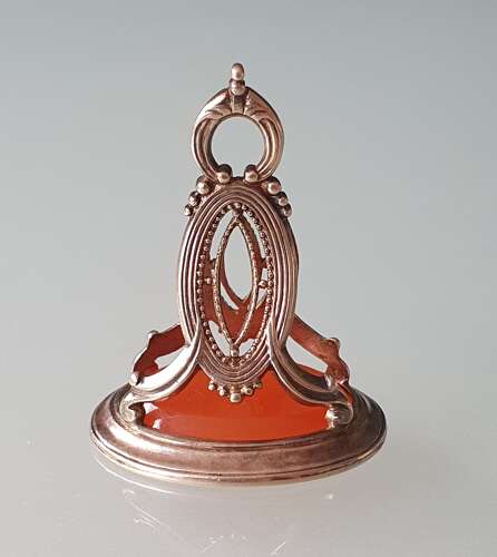 Gold fob seal with intaglio of a classical female head