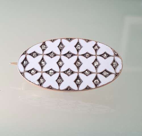White enamel and diamond brooch