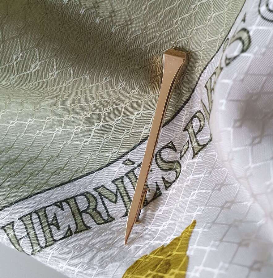 Hermes 18ct gold clou pin brooch